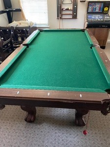 lot 14 image: Pool Table with balls from SEARS - LEGS are Ornate  31X 90 X 50   , also turns into a Ping pong table with all accessories, pool sticks not included  (Located at different location about 10-15 miles away - we will coordinate the removal )