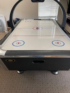 lot 2 image: TOURNAMENT CHOICE  AIR HOCKEY TABLE, comes with all Accessories   56 x 84 x 48  NICE  -- TO BE PICKED UP AT DIFFERENT LOCATION) AT DIFFERENT
