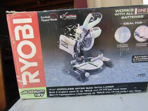 lot 412 image: Ryobi 18 volt, 7 14 cordless midor saw with laser
