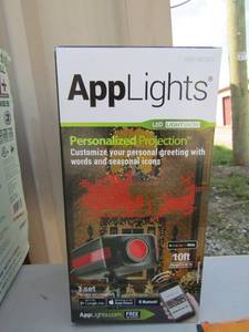 lot 414 image: App light in original box,