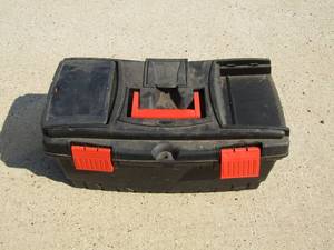 lot 427 image: Black and orange plastic tool box appears to be good shape, empty and ready for use