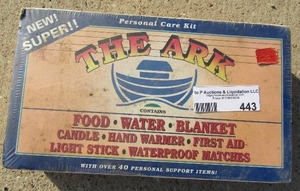 lot 443 image: the ark personal care kit comes wit food, water, blanket, candle, hand warmer, first aid, water proof matches