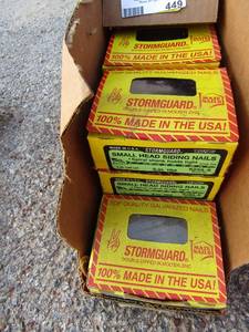 lot 449 image: 7 boxes of storm gard galvanized nails 3 inches