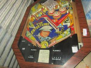 lot 8 image: Roy Clark the ENTERTAINER Pinball machine. Comes with a bag of new playing balls, Missing key lock and left side flipper needs new spring, easy fix- 283928