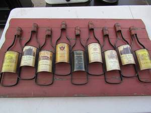 lot 23 image: 2036 wooden wall art with wine dcor