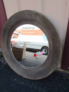 lot 63 image: Oval wall mirror 34 diameter