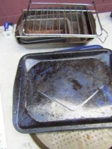lot 80 image: Various pots and pans, pizza pan, Bundt pan, bread pans, and more
