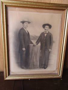 lot 114 image: Vintage black and white wall art of 2 Men  23 X18