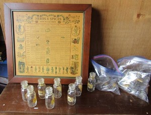 lot 126 image: VINTAGE Herb & Spice Rack W  20 bottles , also has instructions on how to use herbs and spices,  comes with labeled bottles for spices- qty of spice bottles 20