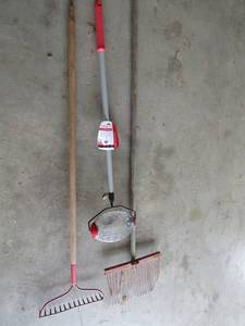 lot 137 image: New pecan picker roller- yard and garden rake
