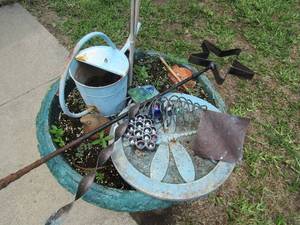 lot 892 image: cast-iron star yard art, water pal, stain glass grape design, green outdoor potter plant