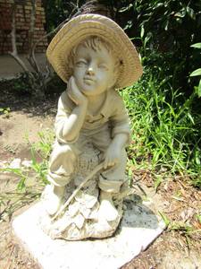 lot 928 image: 19 in yard statue of a little boy
