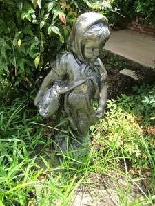 lot 929 image: 31 in girl statue cement, 32 in boy statue cement