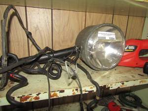 lot 1004 image: huge spot light, B&D trimmer without the blade