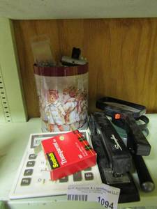 lot 1094 image: office lot of stapler, calculator, stamps, magnifying glass