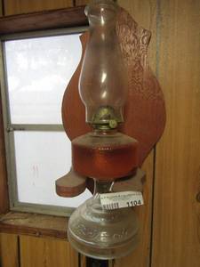 lot 1104 image: vintage Victorian oil lamp mounted on the wall