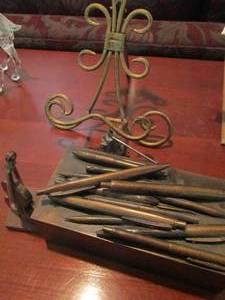lot 1155 image: metal and wooden pen and pencil holder,violen ink pen holder, metal plate stand and more