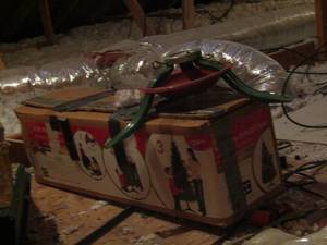 lot 1206 image: 4ft green Christmas tree in box with tree stand