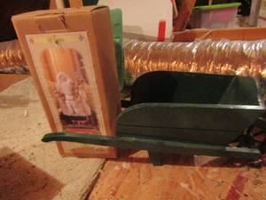 lot 1207 image: 16 inch tall Santa, grandeur Noelle, green 10x24x10 green wooden wheel Burwell