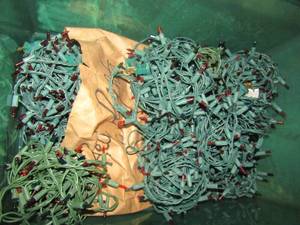 lot 1214 image: green tub full of Christmas lights qty 8 rolls plus