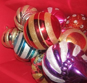 lot 1217 image: red tub full of very large Christmas bulbs
