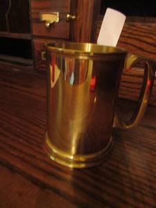 lot 1242 image: things remembered made in Spain handled mug could be brass Has initials VLS