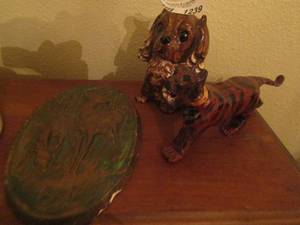 lot 1239 image: handmade wooden tiger, porcelain puppy by HC Novelties , clay plaque with 2 deer on them