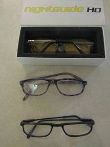 lot 1265 image: 2 pair of eye glasses-- 1 pair of night time vision glasses yellow lenses