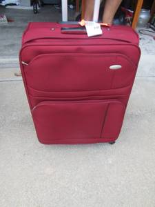 lot 1321 image: Burgundy Samsonite 4 wheel  suitcase