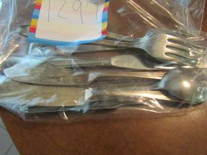 lot 1297 image: Misc. spoons and forks qty 8, also has spreaders