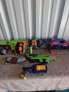 lot 21 image: Lot of 4 NERF Guns---Unknown working condition