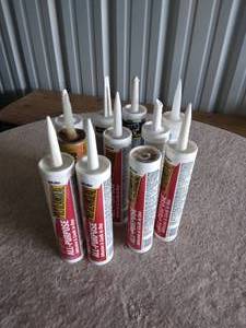 lot 226 image: 11 Tubes of Caulking and Adhesive--Most are full