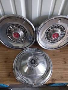 lot 229 image: 3 Vintage LTD Hubcaps