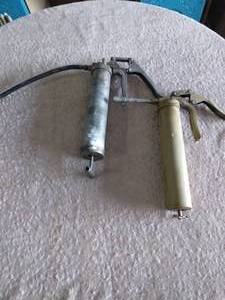 lot 231 image: 2 Vintage Pump Style Grease Guns---Unknown working condition