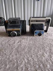 lot 44 image: 2 Vintage Cameras--1 Keystone Rapid Shot and 1 The Handle Kodak Intstant Camera