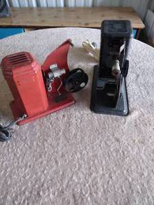 lot 47 image: 2 Vintage 1950s 16mm Film Projectors--Both work but black one needs bulb
