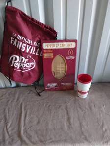 lot 36 image: Dr.Pepper Lot Featuring Fansville Bag, Football Shaped Cutting Board and 5 Plastic D.P. Museum Cups