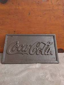 lot 51 image: Coca Cola Cast Iron Trivet