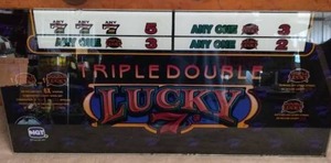 lot 63 image: Triple Double Lucky 7 Glass Slot Machine Topper