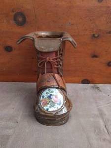 lot 66 image: The Clay Cobbler Flower Pot with Floral Design