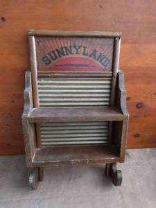 lot 75 image: Sunnyland Wash Board Wall Hanging Shelf--Columbus Wash Board Company