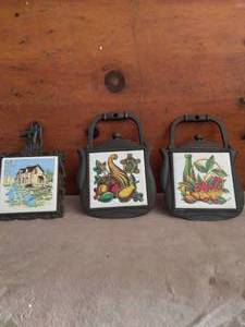 lot 103 image: Selection of 3 Cast Iron and Tile Trivets