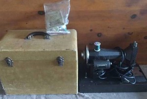 lot 104 image: Antique Kenmore Sewing Machine with Case and Accessories---Unknown working condition