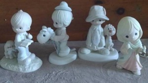 lot 112 image: Lot of 4 Precious Moments Figurines from Various Years---Please see pics
