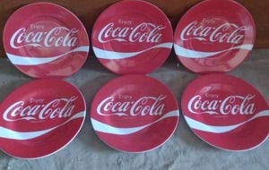 lot 115 image: Selection of 6 Plastic Coca Cola Plates