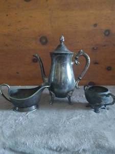 lot 120 image: Silverplated Items--Leonard Teapot, Rogers Sugar Bowl, and H.B. & H Creamer Boat