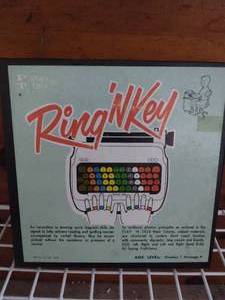 lot 137 image: 1968 Ring N Key Reading and Spelling Development Teaching Aide---Complete