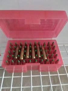 lot 165 image: 56 Rounds of Ammo--Not sure what kind of ammo this is---Maybe 30-06