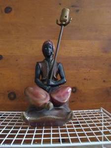 lot 162 image: Mid Century Chalkware Genie Lamp--Has no cord and big chip on back corner