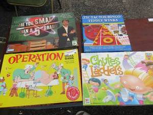 lot 36 image: Game lot includes, operation- are you smarter then a 5th grader- chutes and ladders- Pictionary